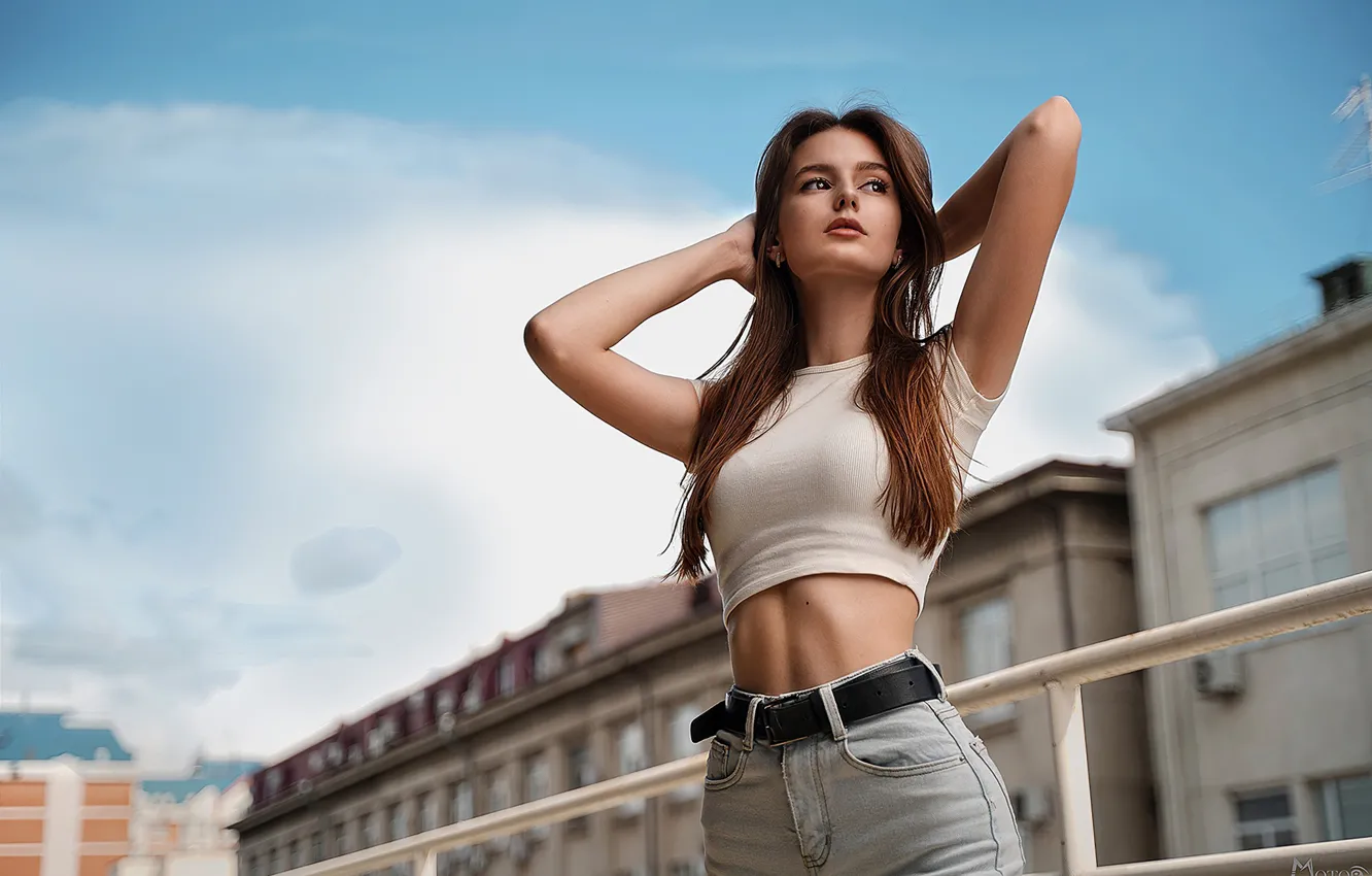 Photo wallpaper sky, clouds, model, women, jeans, brunette, public, short tops