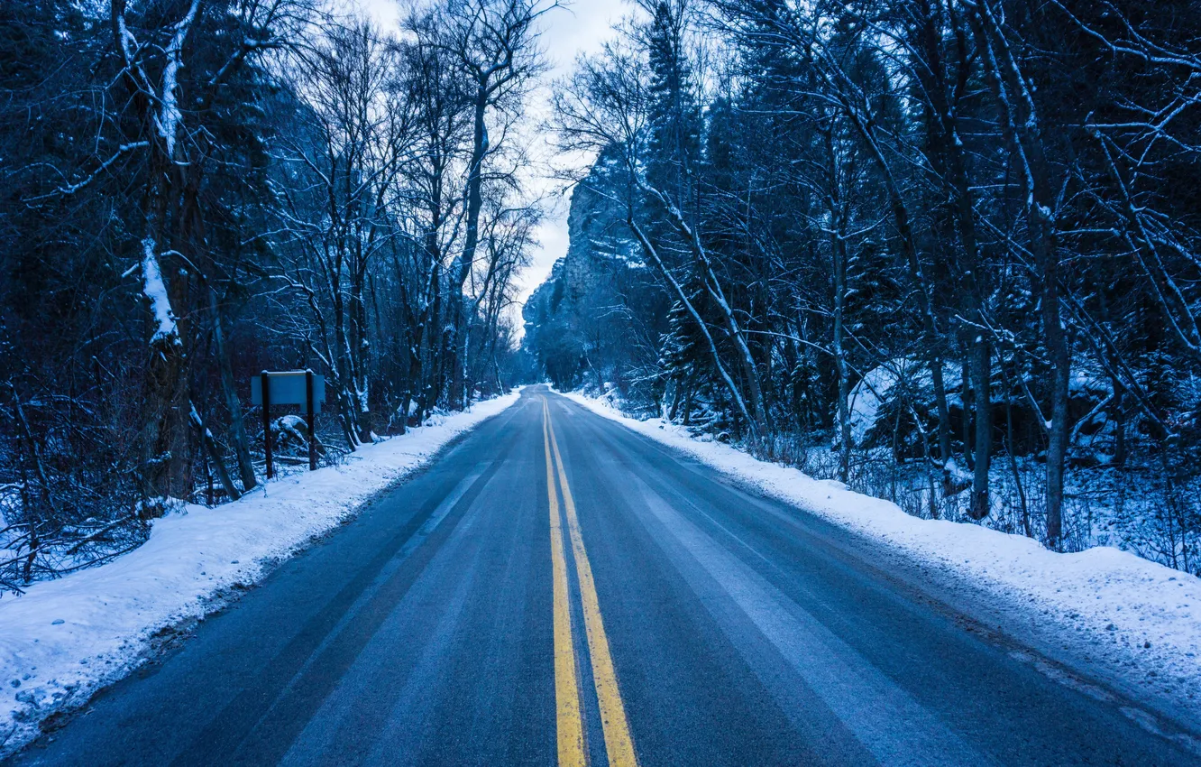 Photo wallpaper winter, road, forest, the sky, asphalt, clouds, snow, trees