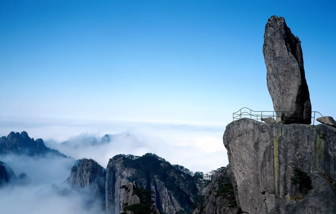 Photo wallpaper clouds, mountains, stones, rocks, height