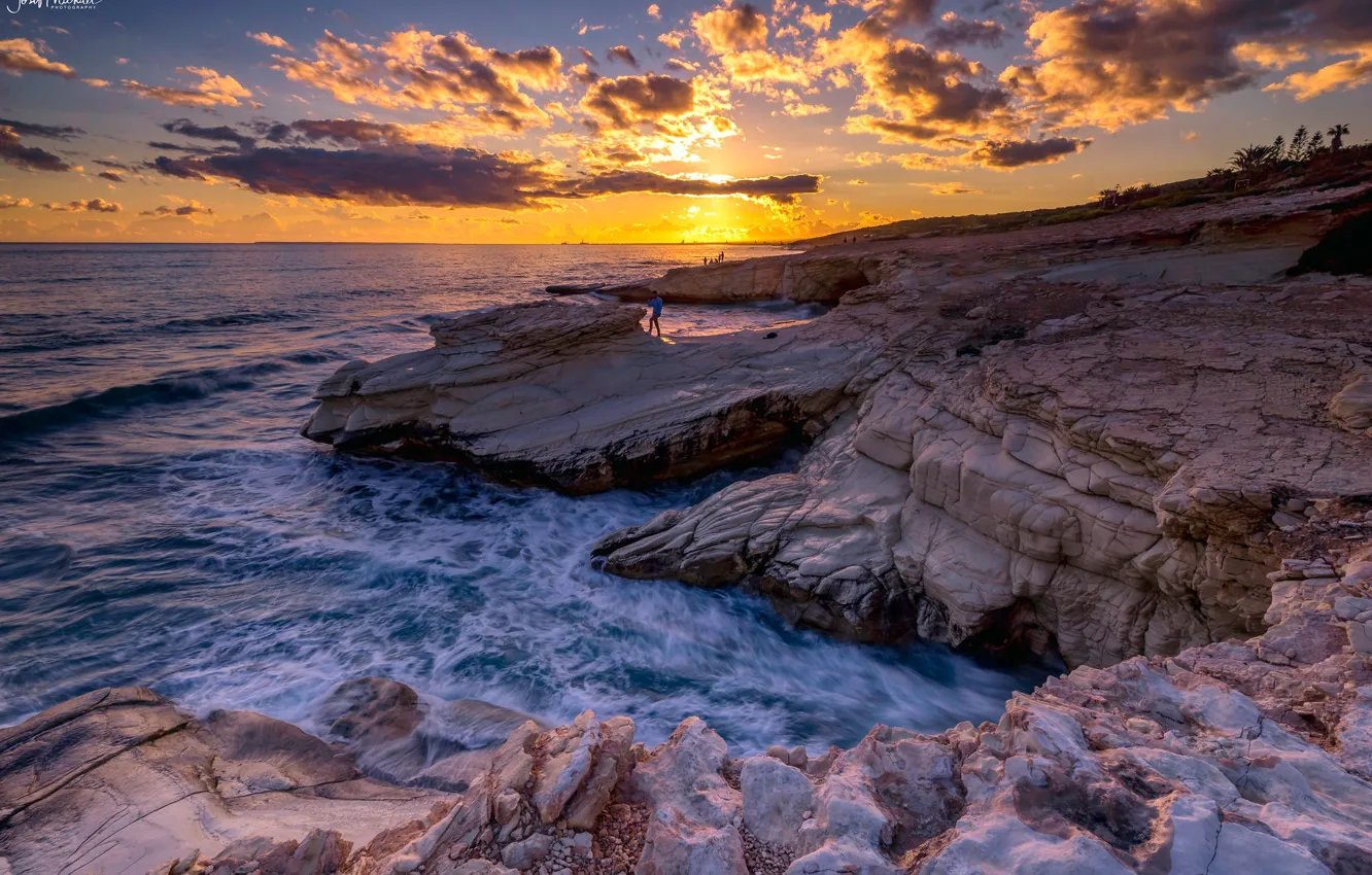 Photo wallpaper sea, the sky, the sun, clouds, sunset, stones, people, rocks