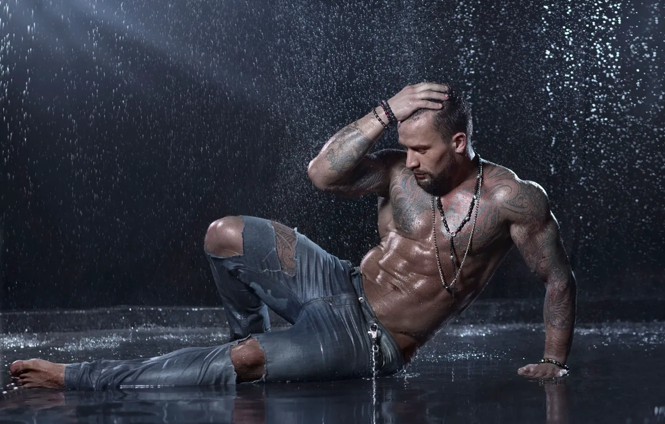 Photo wallpaper water, pose, rain, model, jeans, tattoo, guy, torn