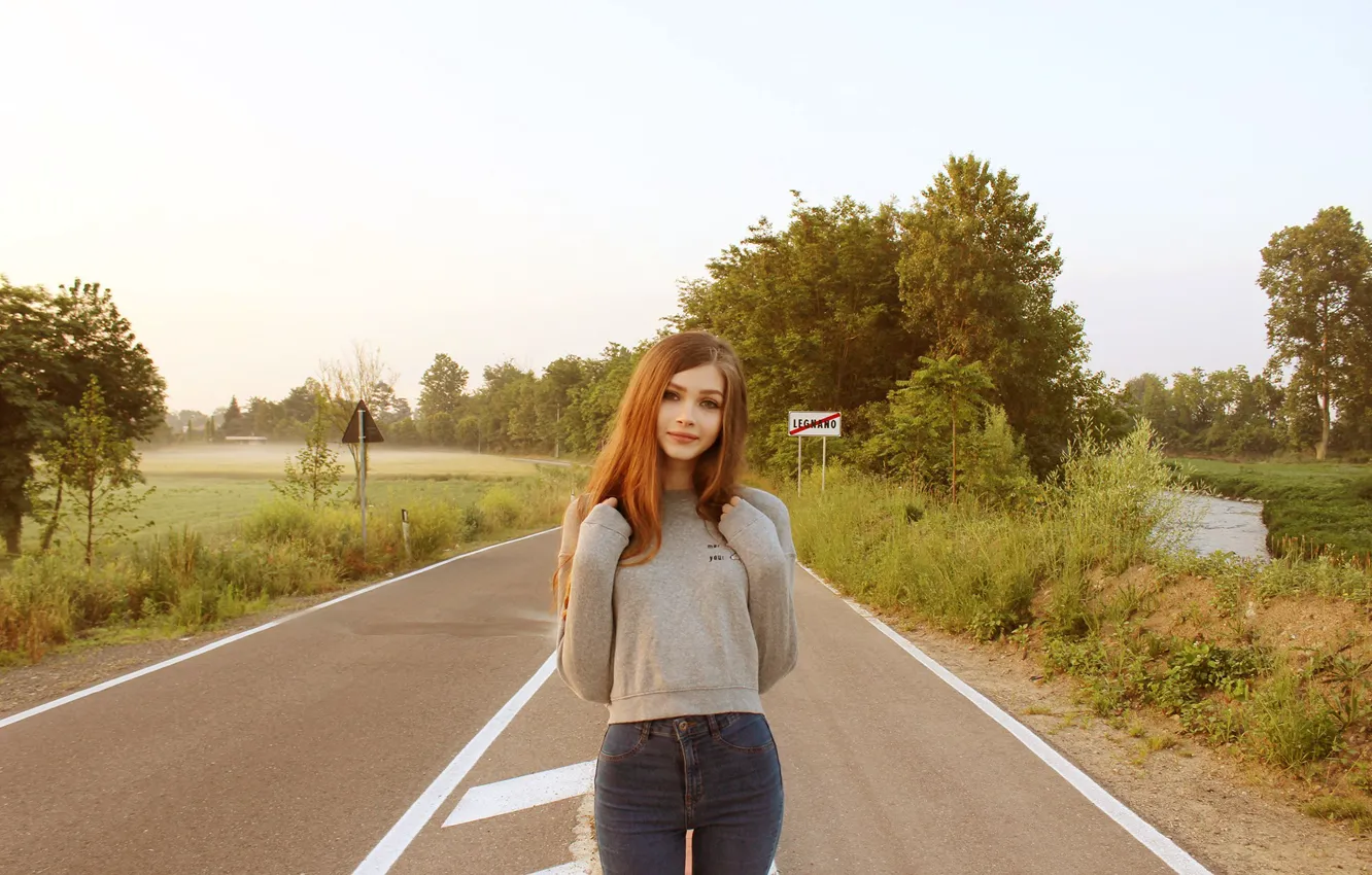 Photo wallpaper road, greens, look, girl, trees, nature, smile, sign