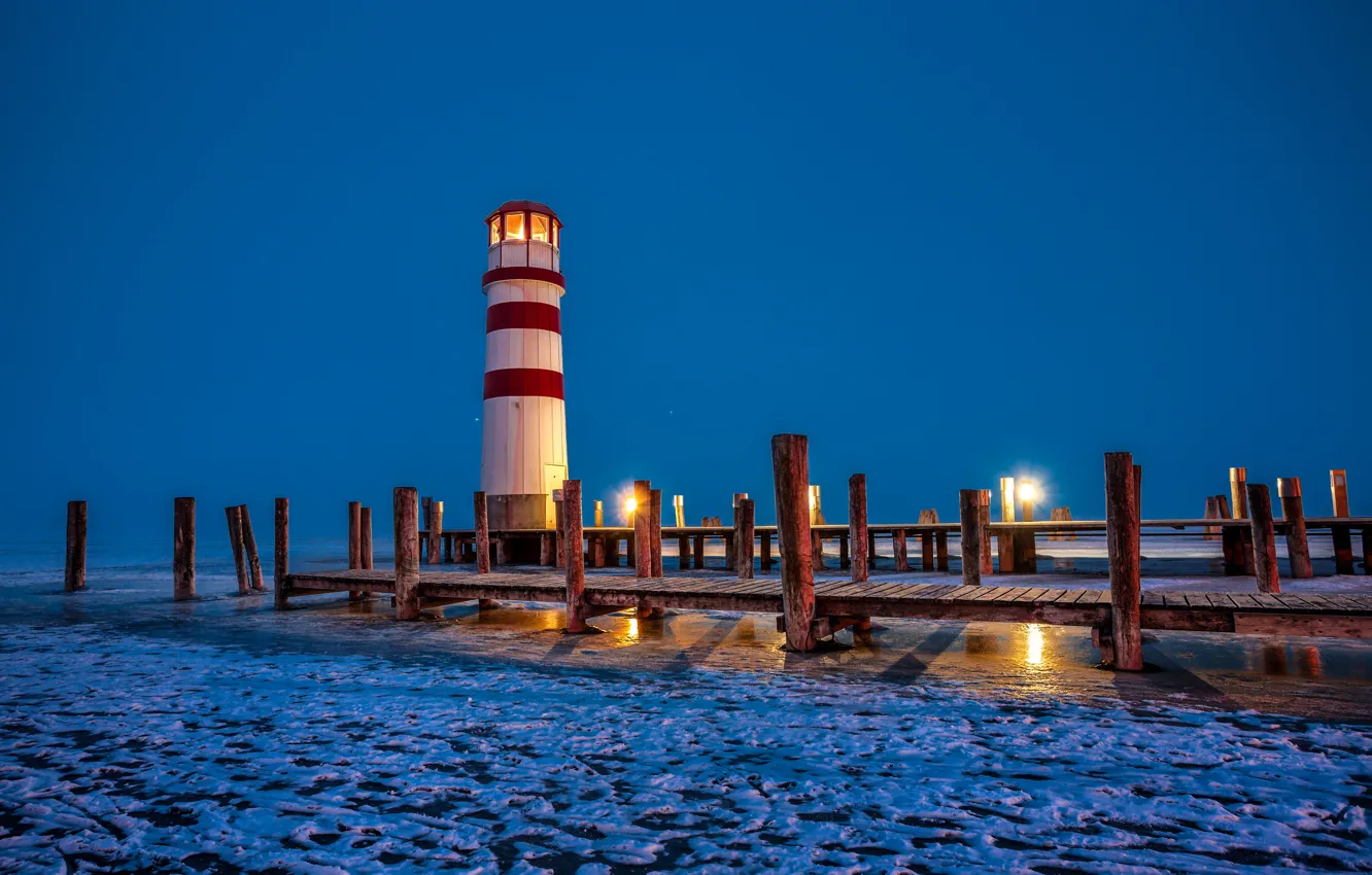 Photo wallpaper ice, lighthouse, the evening, lake, lights, Podersdorf, piles, Austria