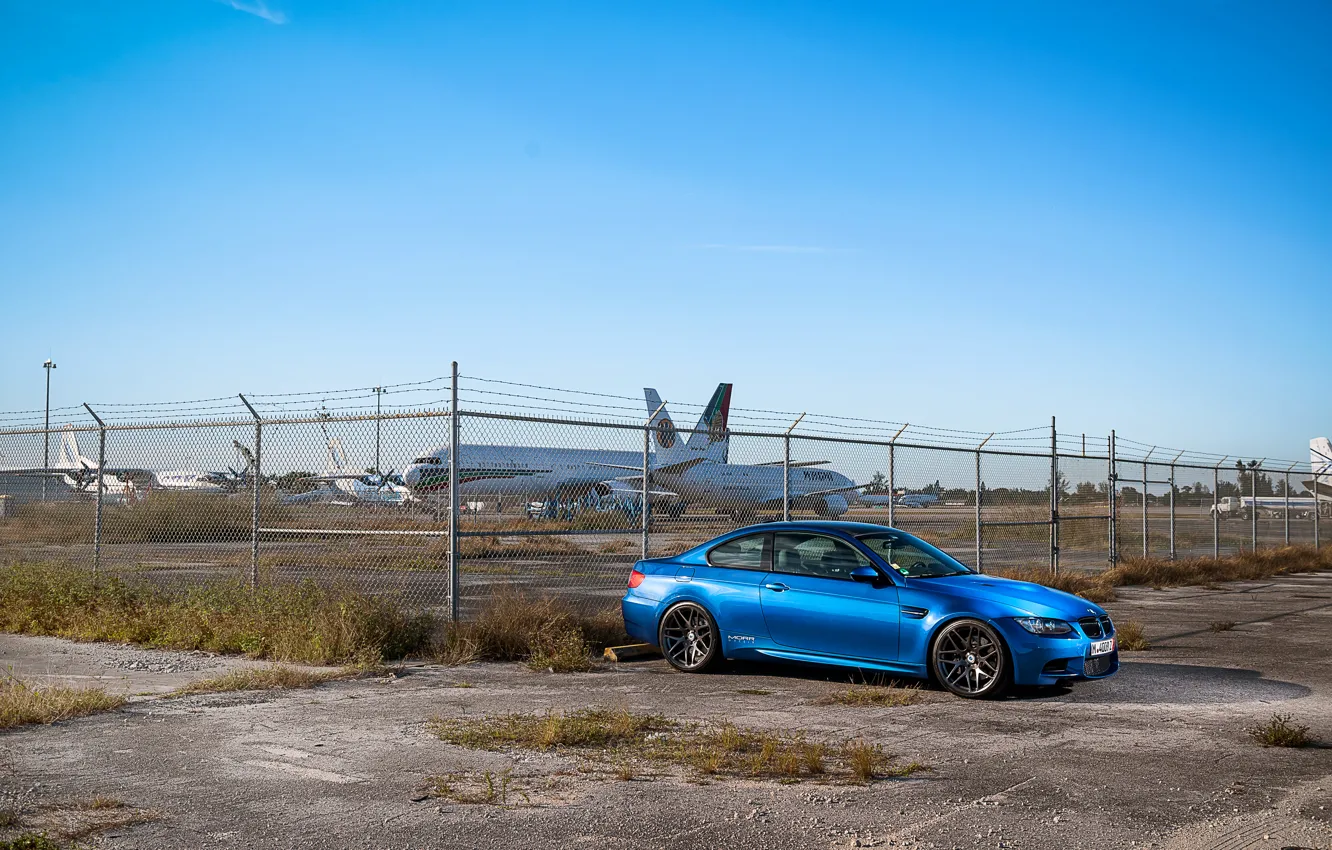 Photo wallpaper blue, bmw, BMW, the fence, side view, blue, barbed wire, e92
