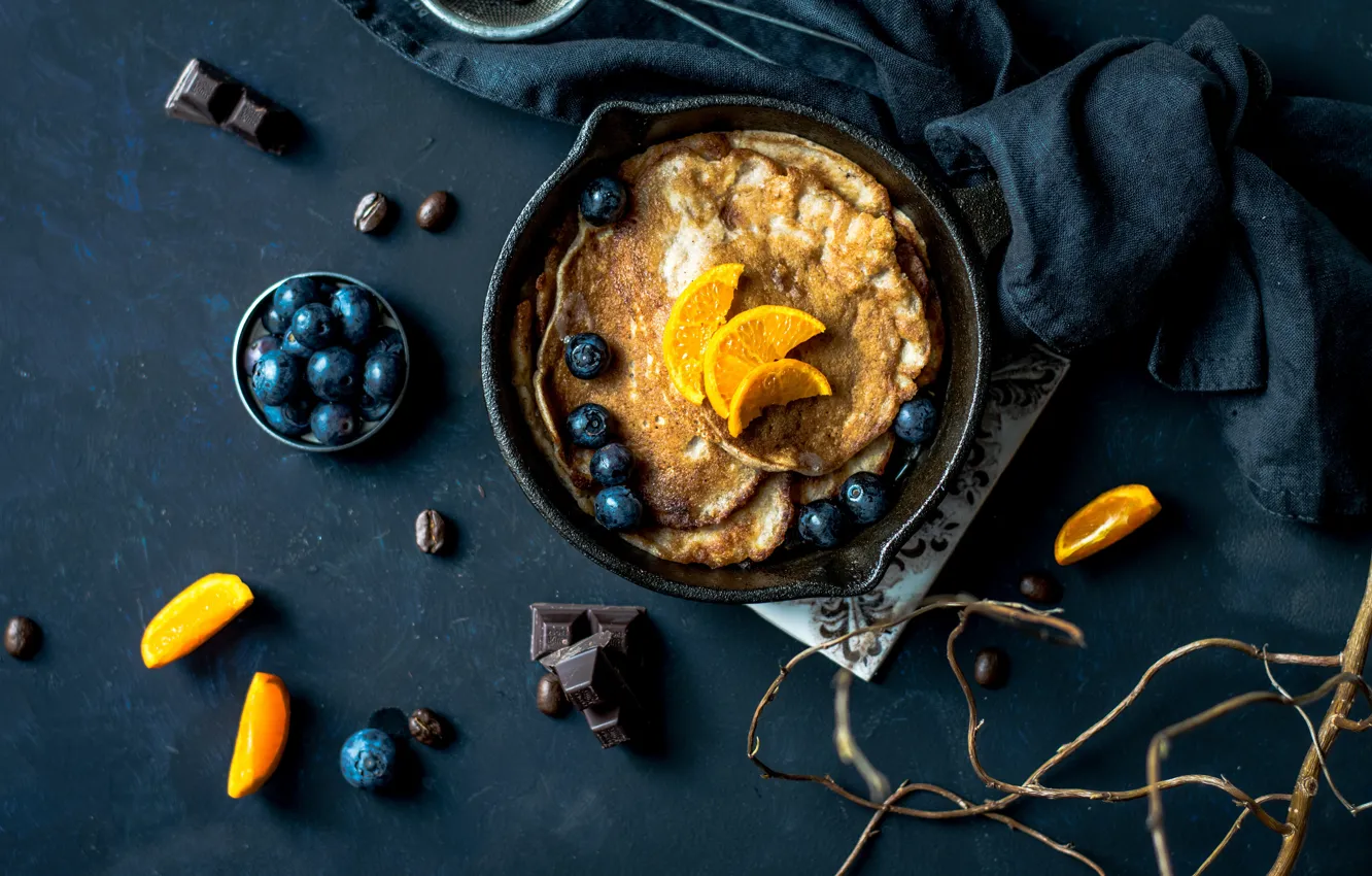 Photo wallpaper orange, the dark background, pan, table, cakes, submission, towel, blueberries