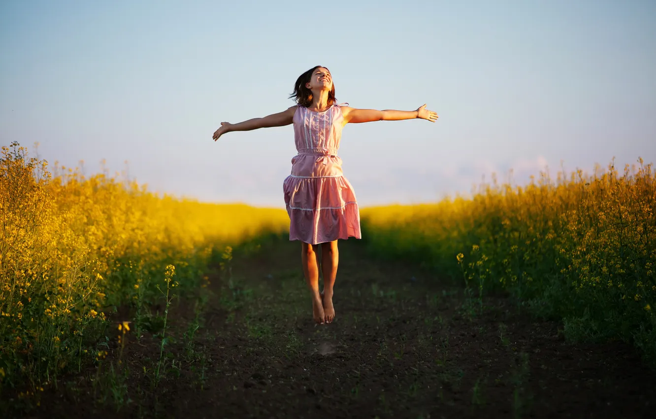 Photo wallpaper field, girl, jump, brown hair
