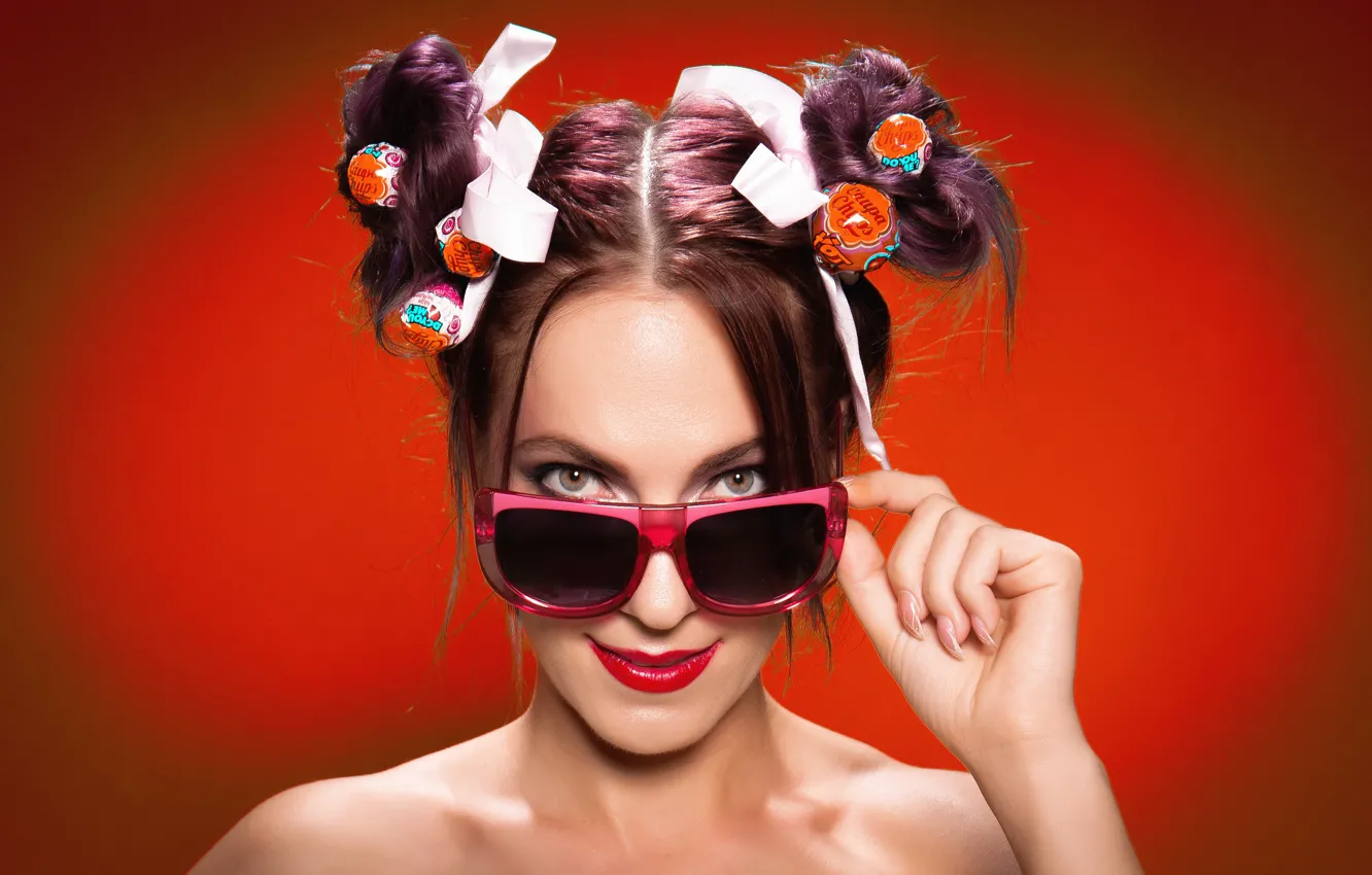 Photo wallpaper look, girl, face, hand, glasses, candy, lollipops, red background