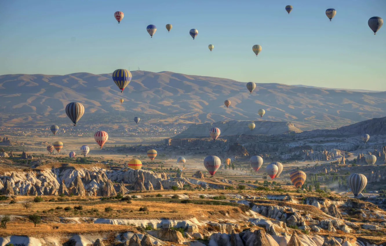 Photo wallpaper the sky, flight, mountains, rocks, hills, balls, air, the rise