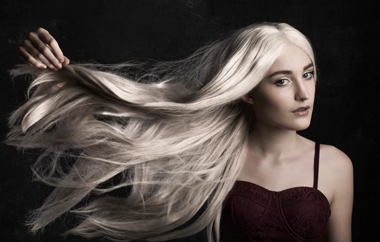 Photo wallpaper girl, face, the dark background, portrait, hands, piercing, blonde, shoulders