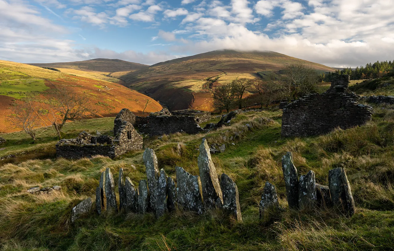 Photo wallpaper grass, clouds, mountains, stones, hills, vegetation, slope, house