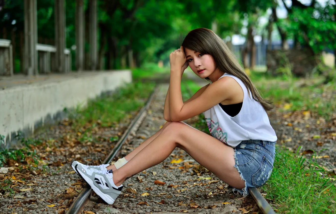 Photo wallpaper girl, shorts, rails, legs, Asian, t-shirt, sitting, sneakers