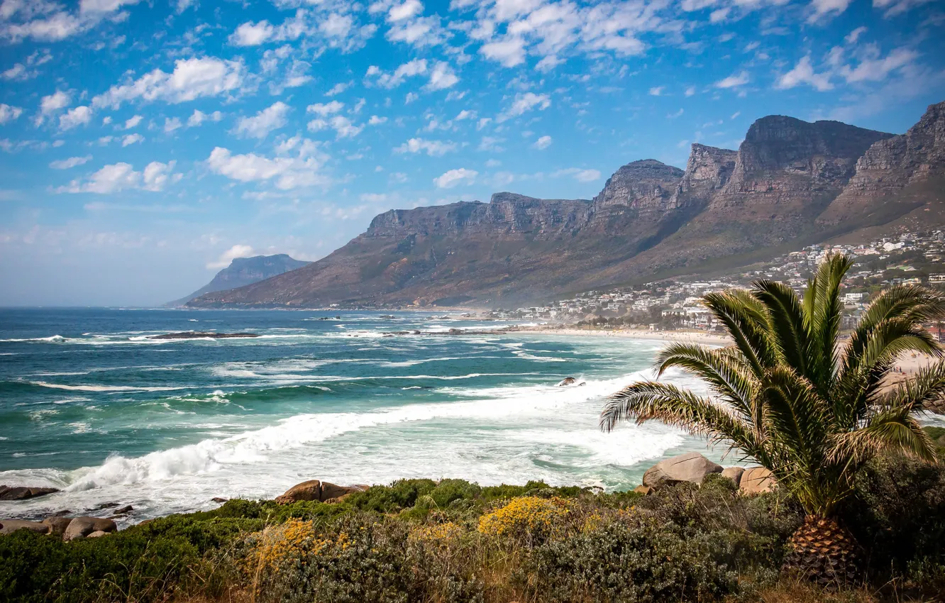 Photo wallpaper sea, wave, beach, the sky, clouds, mountains, the city, blue