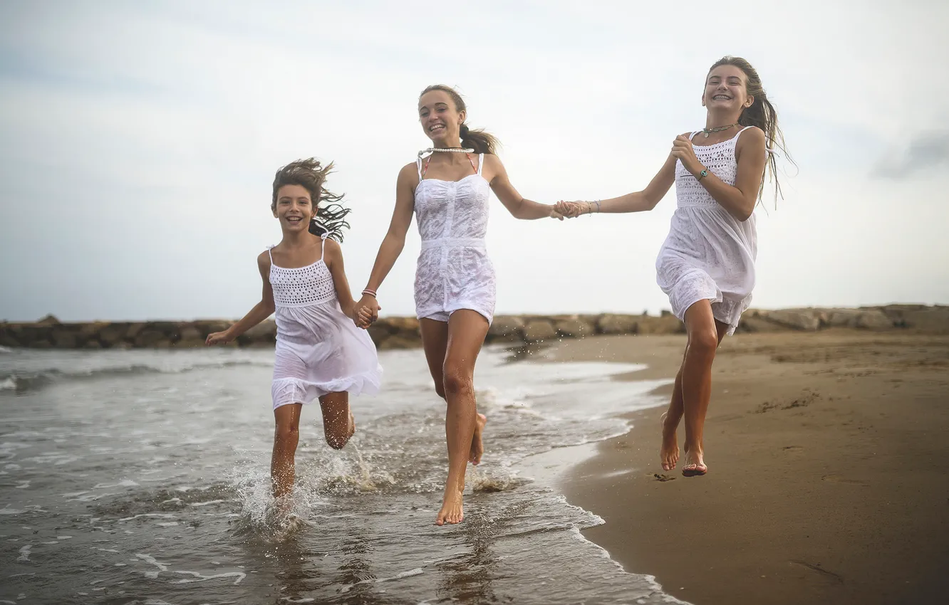 Photo wallpaper joy, children, shore, girls, laughter, running, the surf