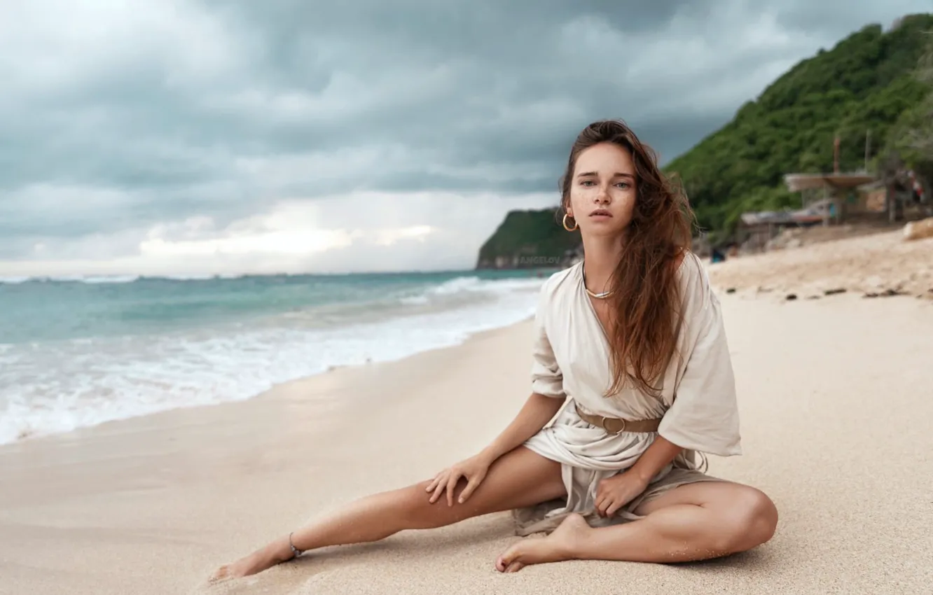 Photo wallpaper sand, beach, look, girl, pose, the ocean, feet, hair