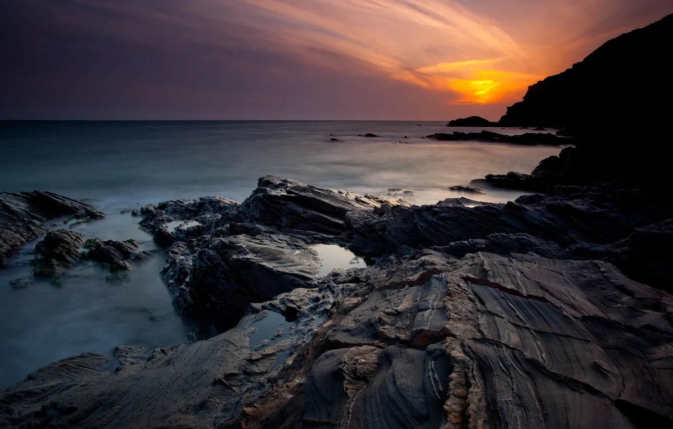 Photo wallpaper mountains, stones, the ocean, dawn