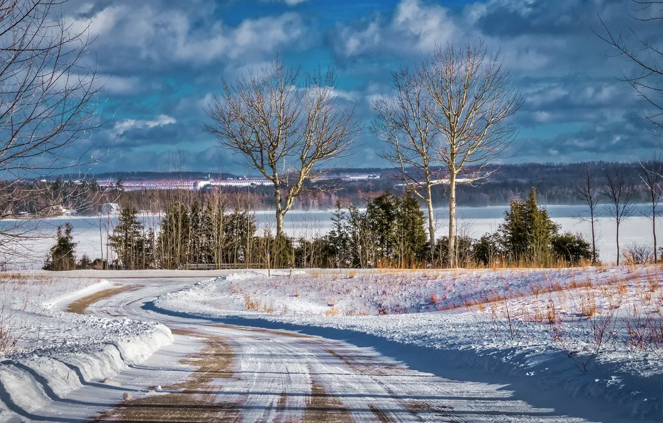 Photo wallpaper winter, road, forest, the sky, the sun, clouds, snow, trees