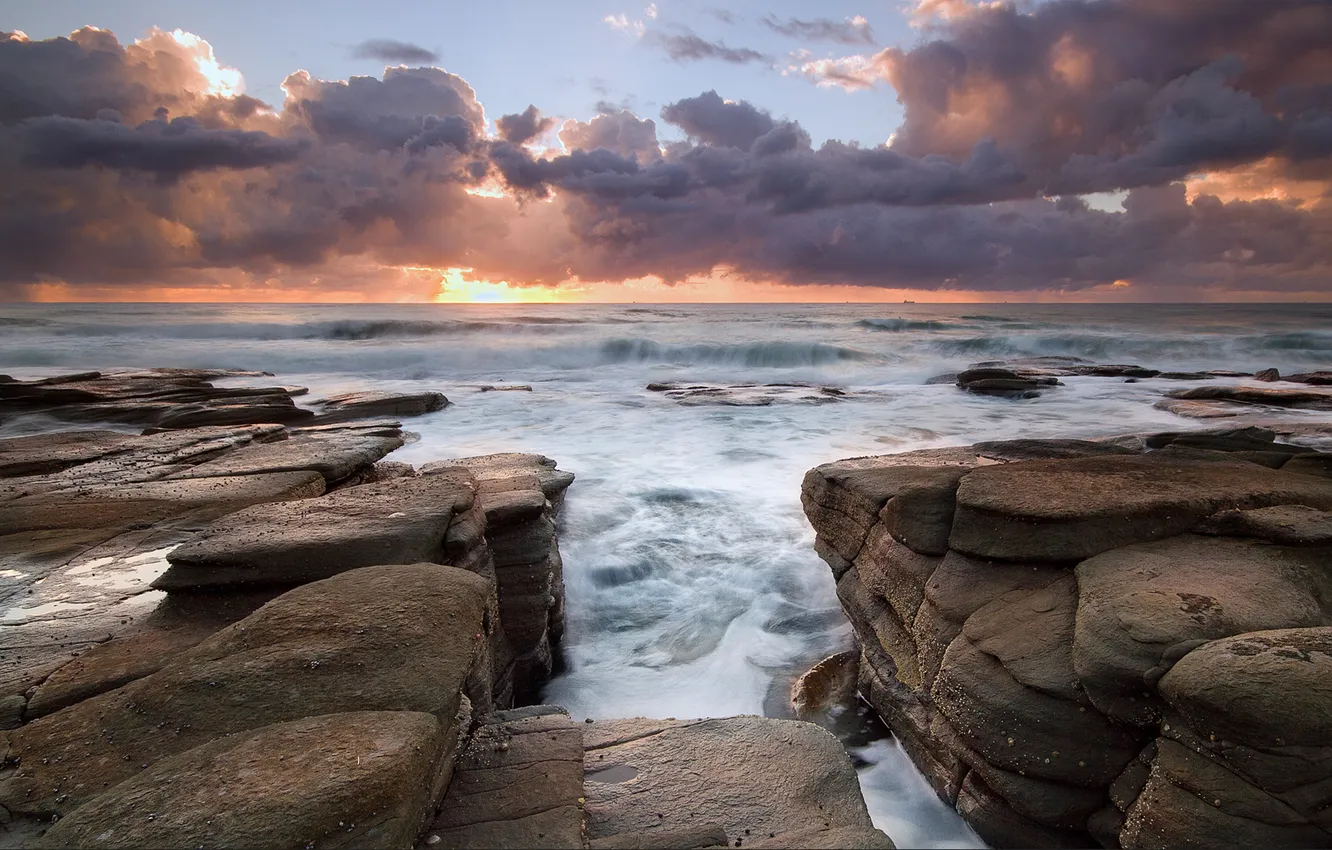 Photo wallpaper water, the sun, clouds, sunset, fog, stones, the rays of the sun, Australia
