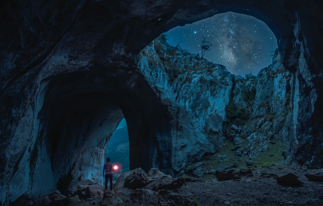 Photo wallpaper lights, people, arch, night, rocks, cave, arch