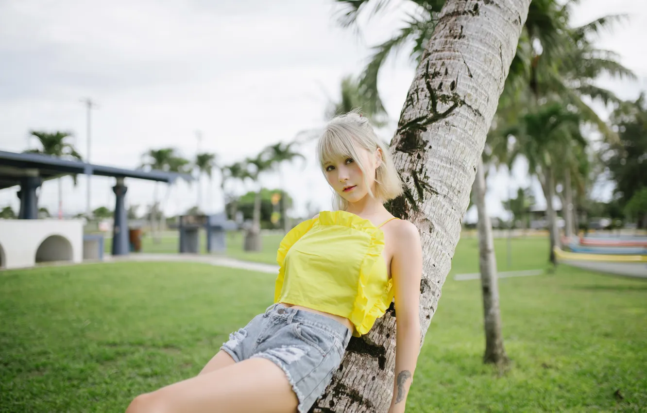 Photo wallpaper grass, look, landscape, palm trees, lawn, model, shorts, portrait