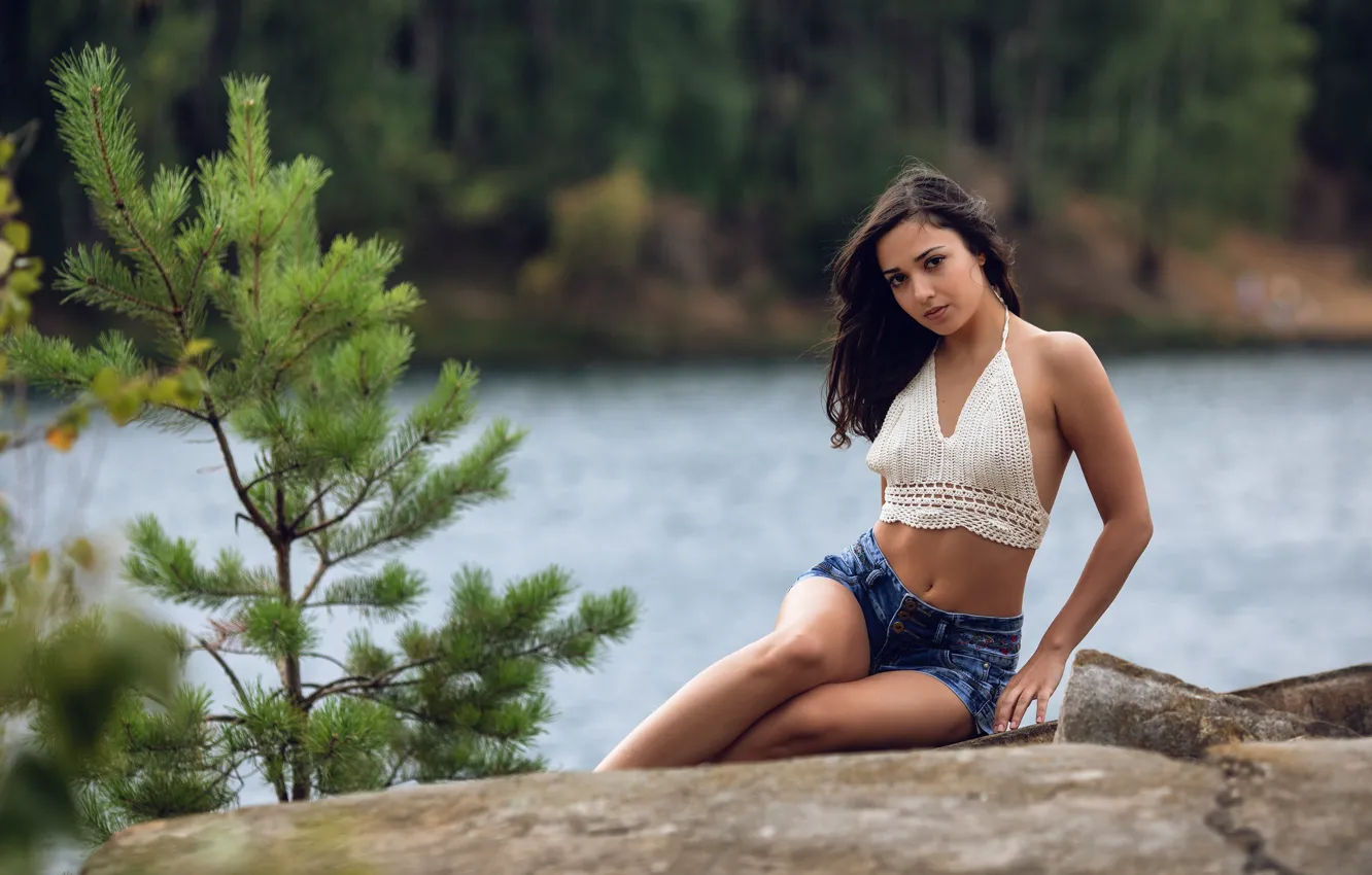 Photo wallpaper trees, nature, lake, model, women, brunette, sitting, jean shorts
