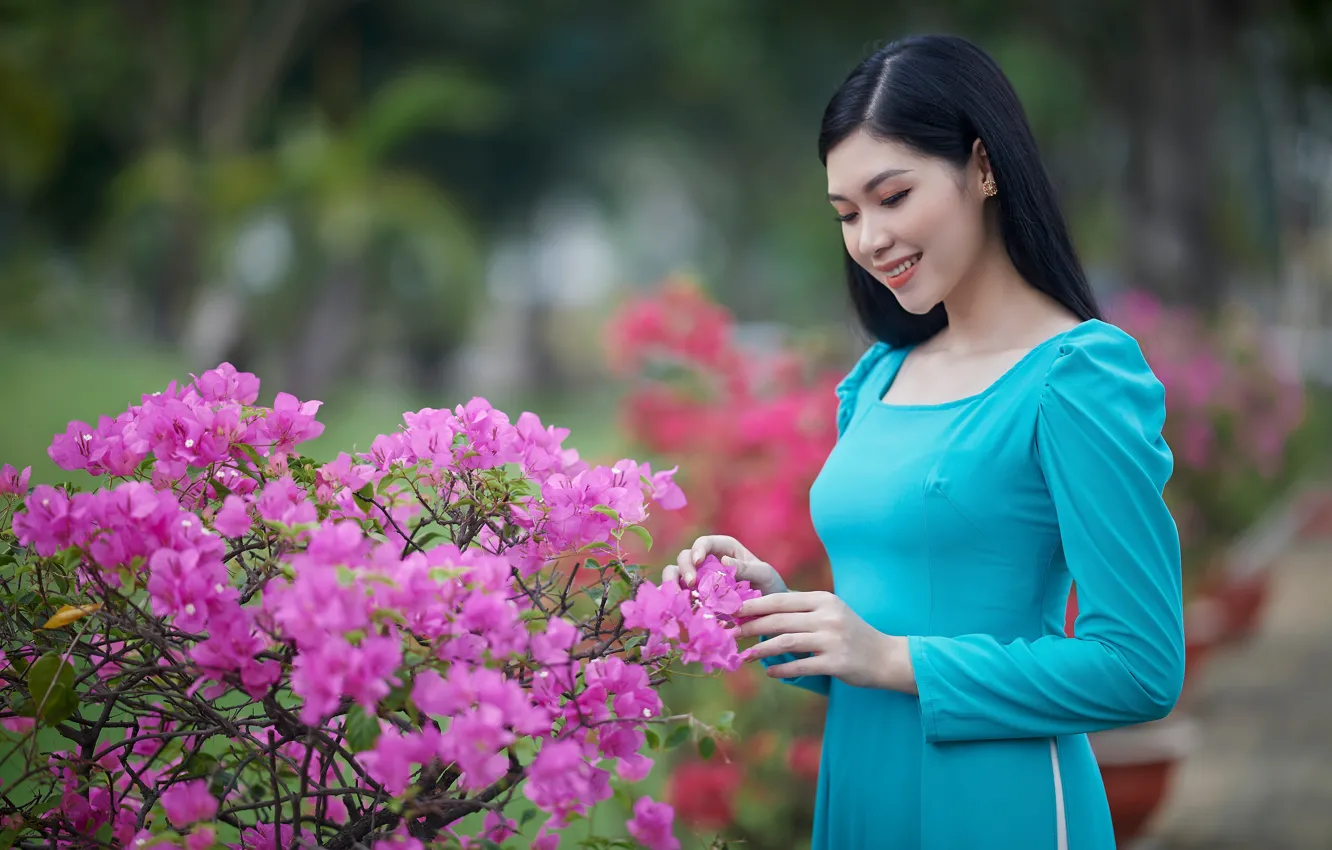 Photo wallpaper girl, flowers, branches, nature, face, pose, smile, Park