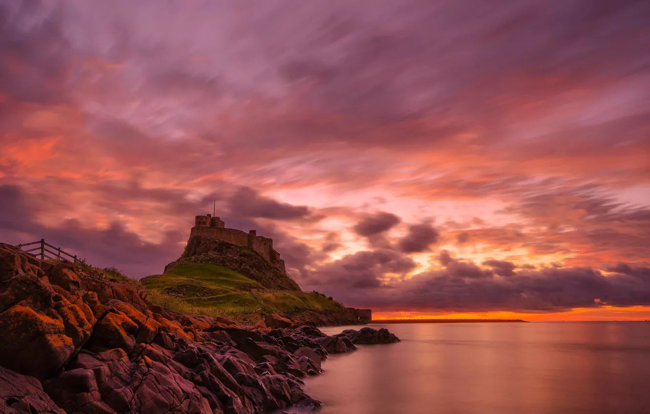 Photo wallpaper clouds, rock, stones, England, mountain, glow, Holy island, Lindisfarne