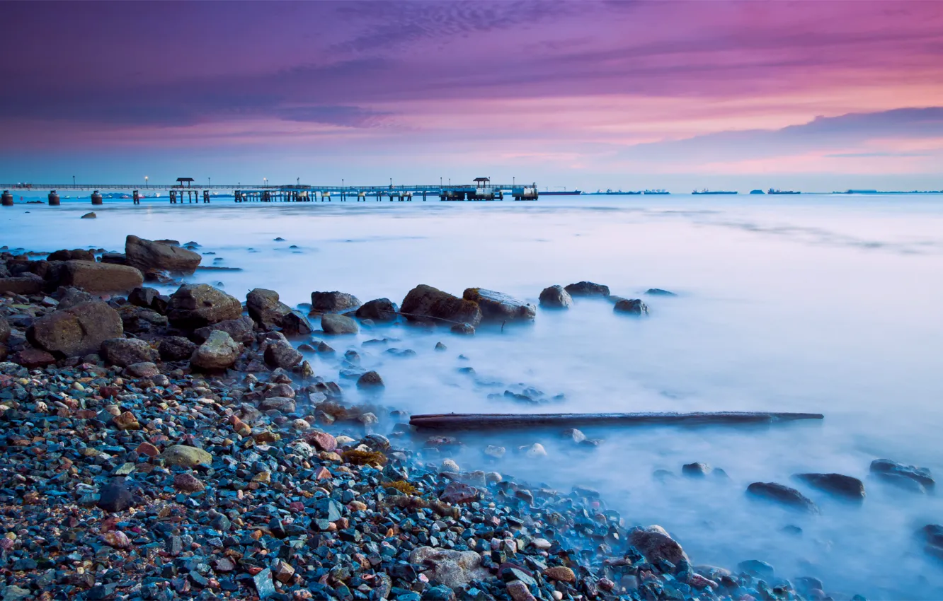 Photo wallpaper sea, the sky, clouds, sunset, bridge, stones, lilac, shore