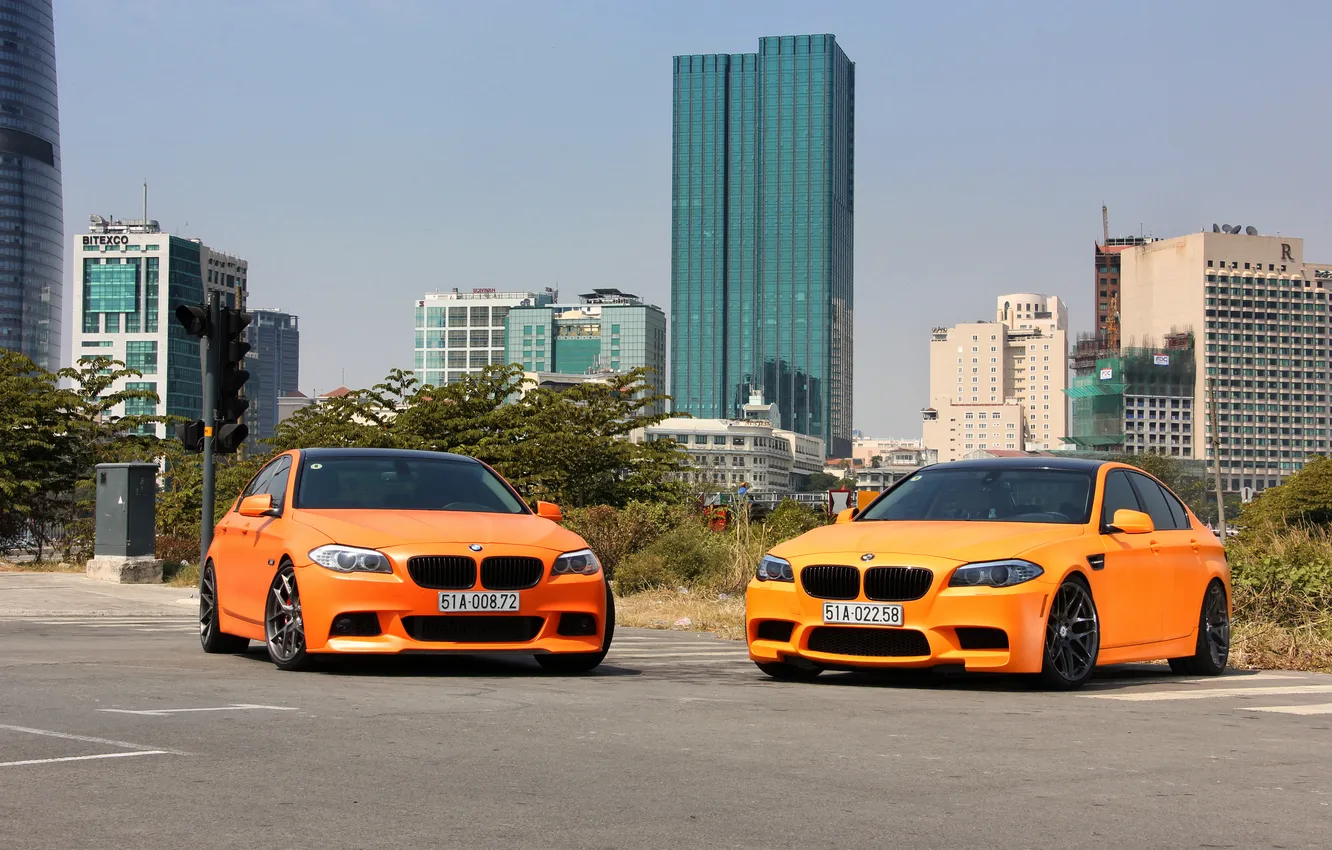 Photo wallpaper the sky, orange, the city, building, BMW, BMW, front view, orange