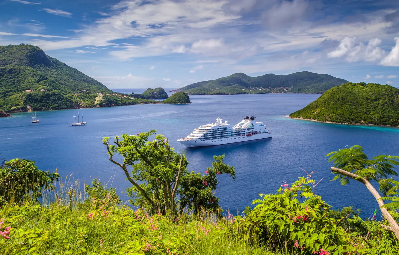 Photo wallpaper sea, greens, the sky, grass, the sun, clouds, mountains, coast