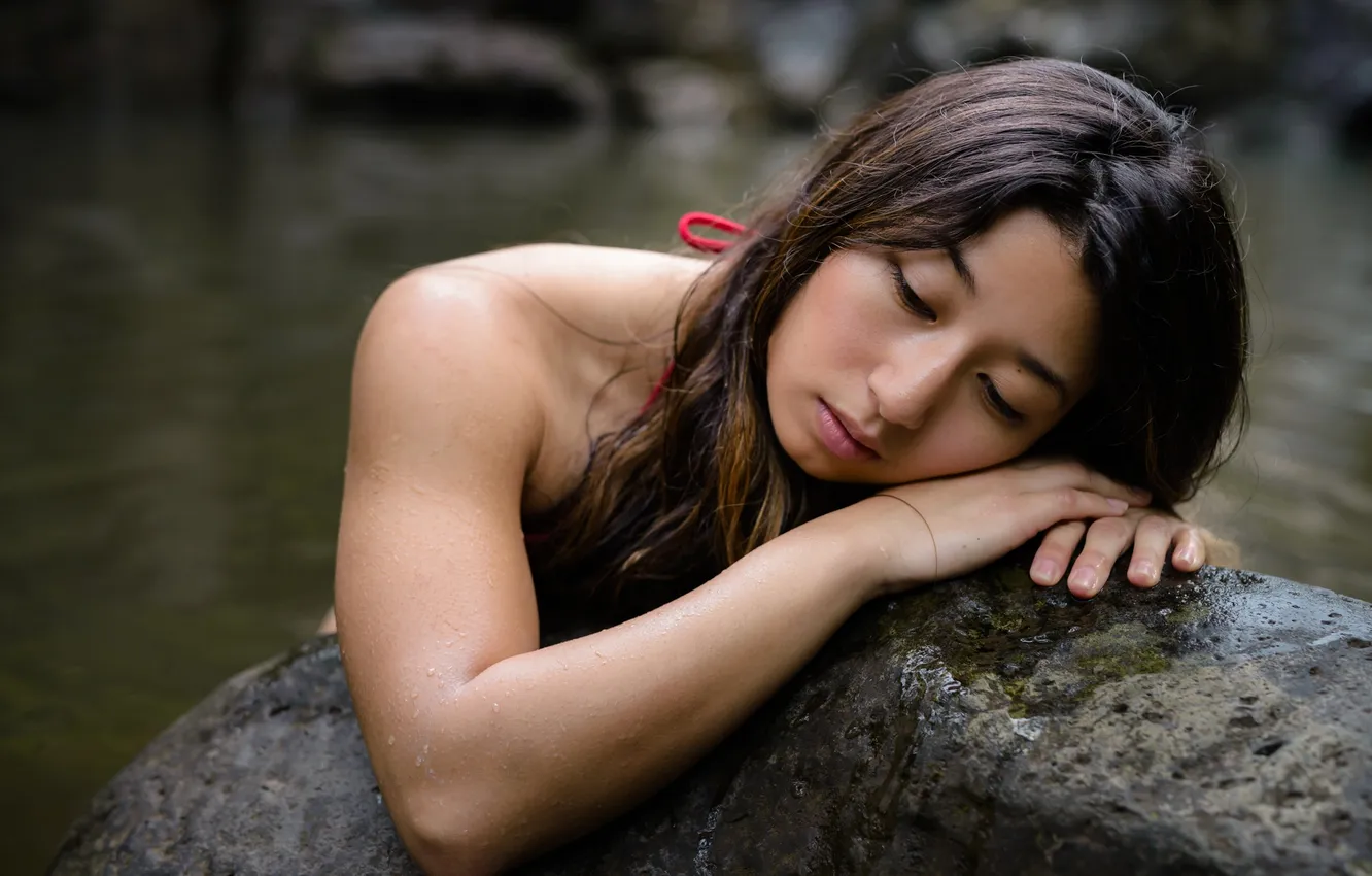 Photo wallpaper girl, face, stones, hair