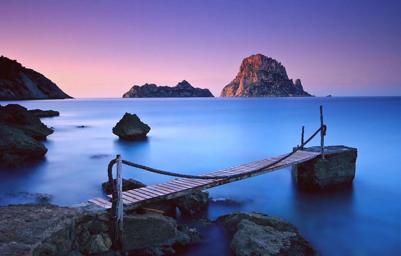 Photo wallpaper sea, the sky, sunset, mountains, blue, stones, the ocean, rocks