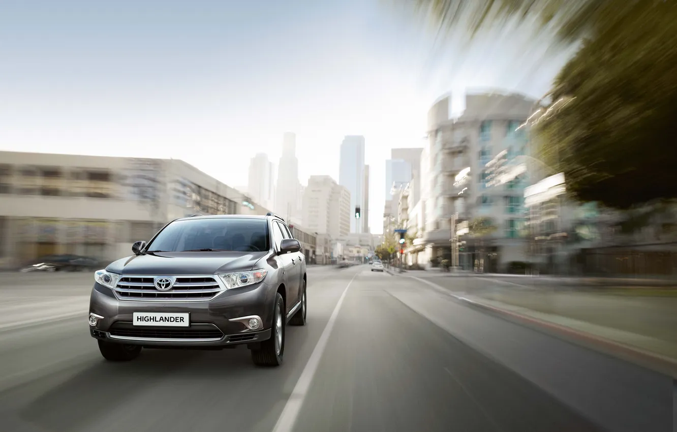 Photo wallpaper street, speed, skyscrapers, jeep, Toyota, the front, Toyota, crossover