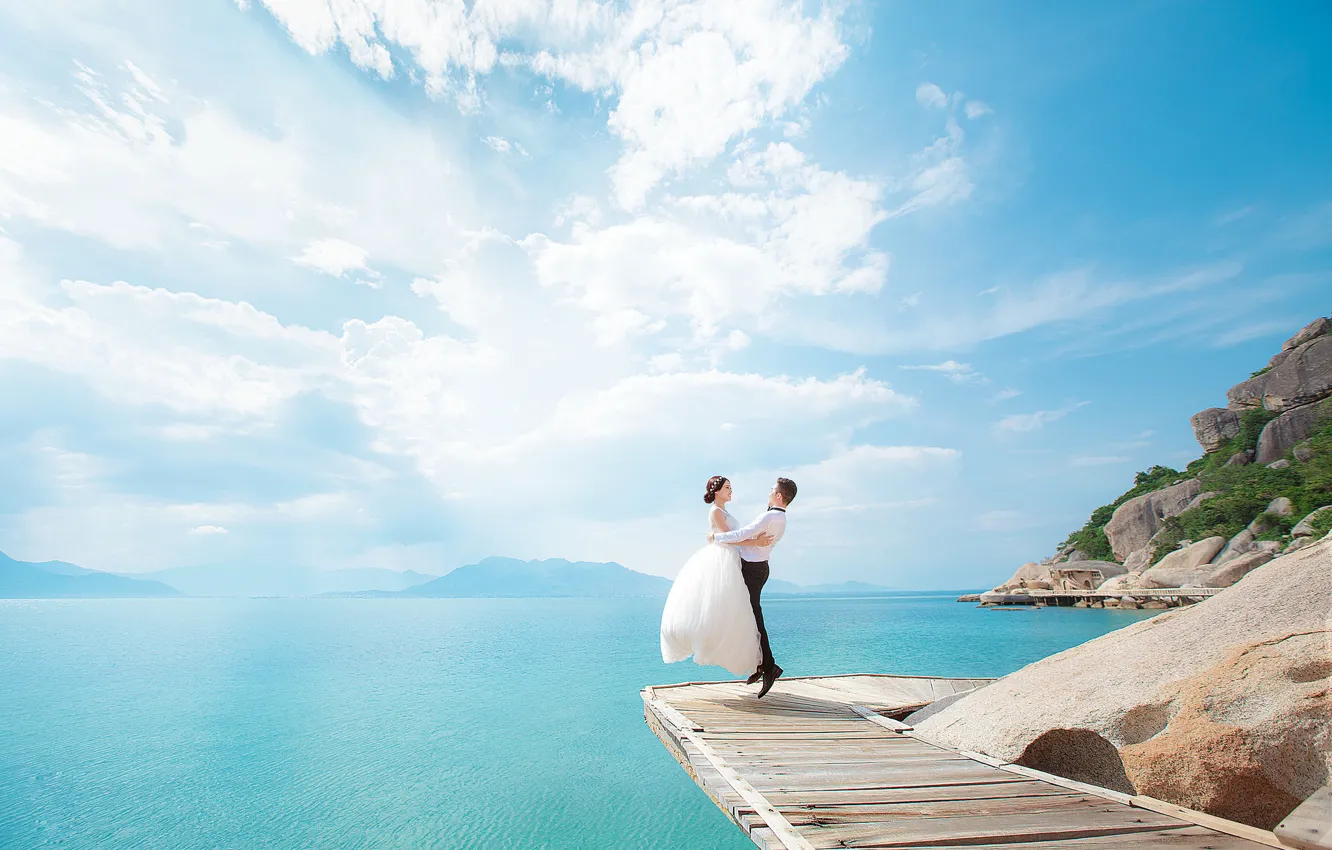 Photo wallpaper the sky, the sun, Islands, clouds, jump, bouquet, pair, the bride