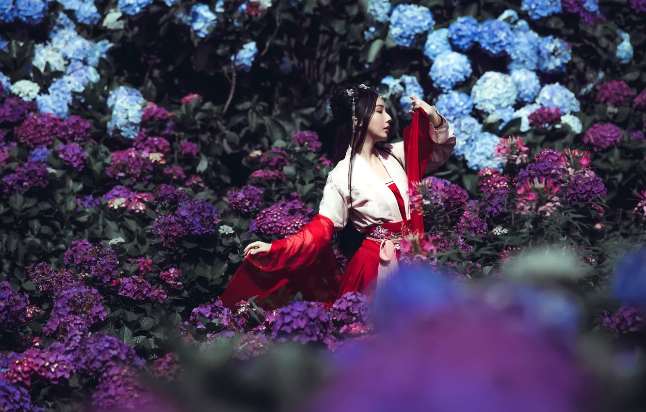 Photo wallpaper purple, girl, flowers, red, pose, blue, hands, garden