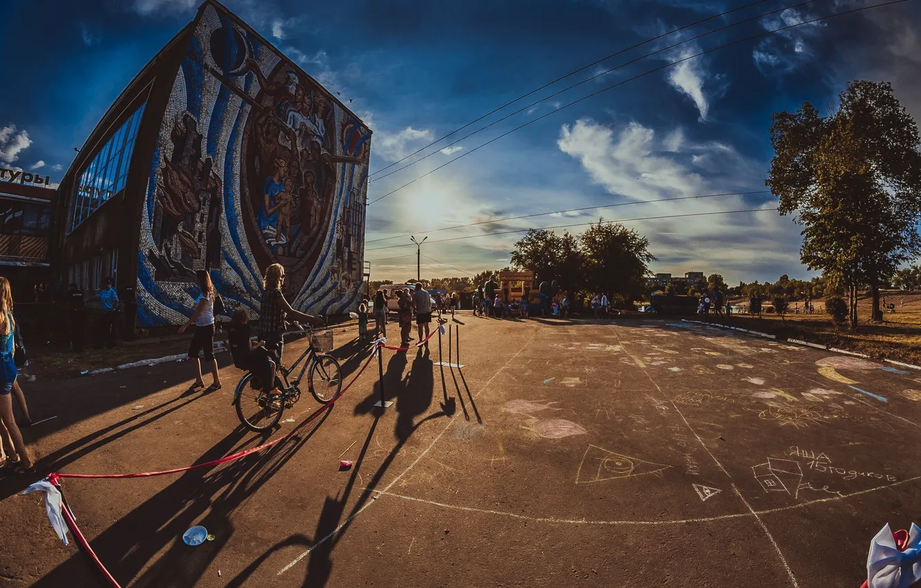 Photo wallpaper beach, the sky, asphalt, girl, the sun, clouds, trees, sunset