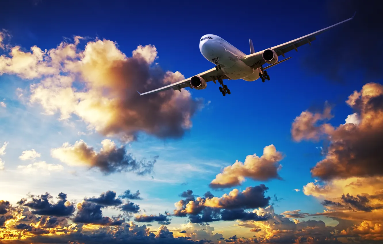 Photo wallpaper clouds, sunset, flight, flies, in the sky, passenger, airliner