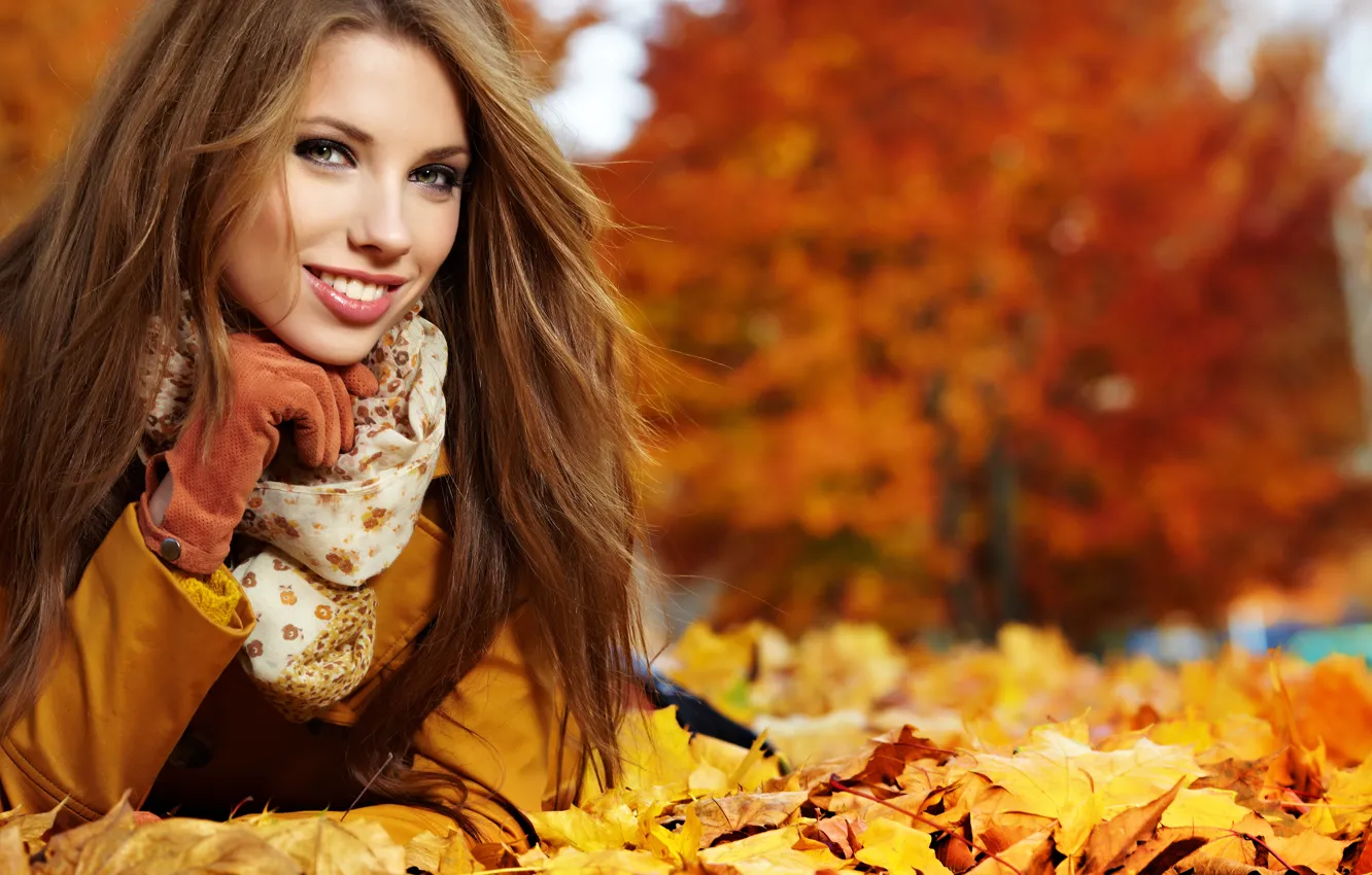 Photo wallpaper autumn, look, leaves, girl, smile, gloves, brown hair, scarf