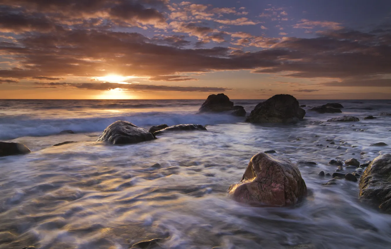 Photo wallpaper sunset, stones, England, England, Wales, The Irish sea, Porth Towyn, Irish Sea