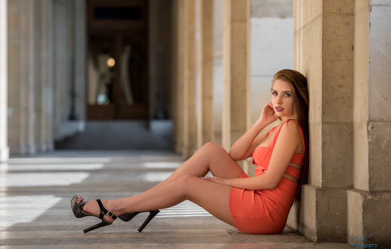 Photo wallpaper girl, the city, red, dress, brunette, columns, heels, sitting