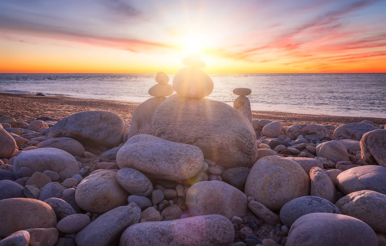 Photo wallpaper beach, the sky, the sun, rays, light, sunset, pebbles, stones