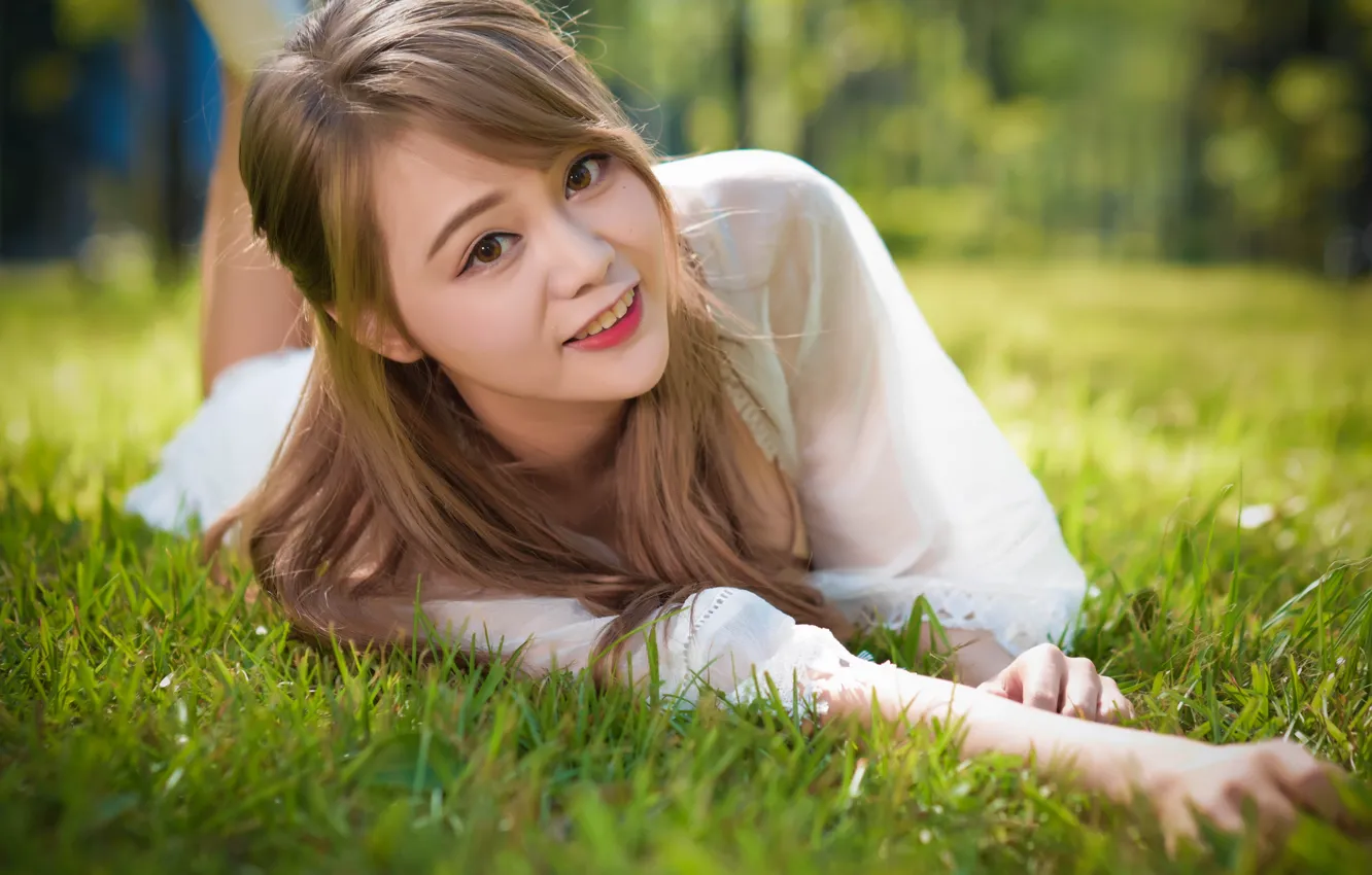 Photo wallpaper grass, girl, smile, beautiful, looks