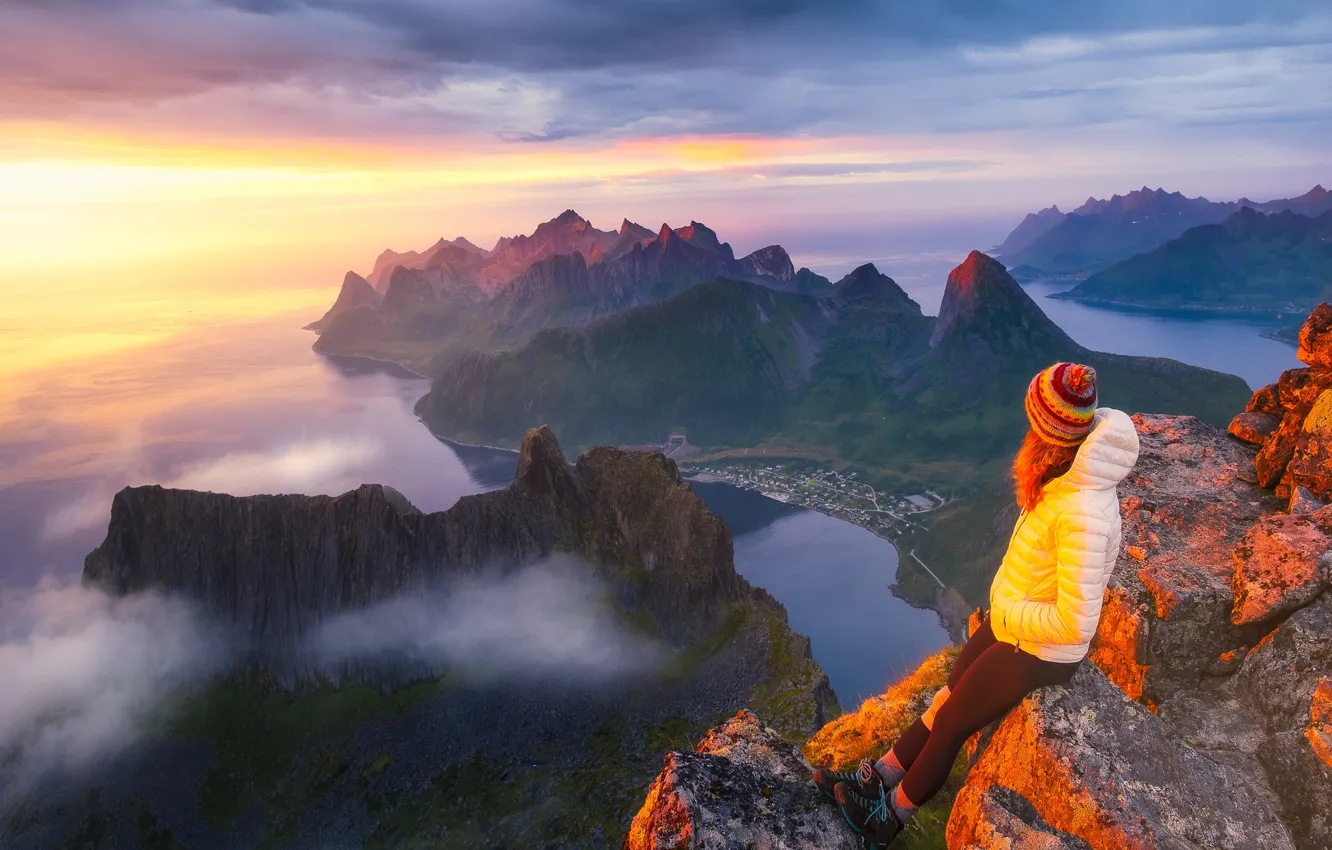 Photo wallpaper girl, clouds, light, mountains, fog, open, rocks, dawn