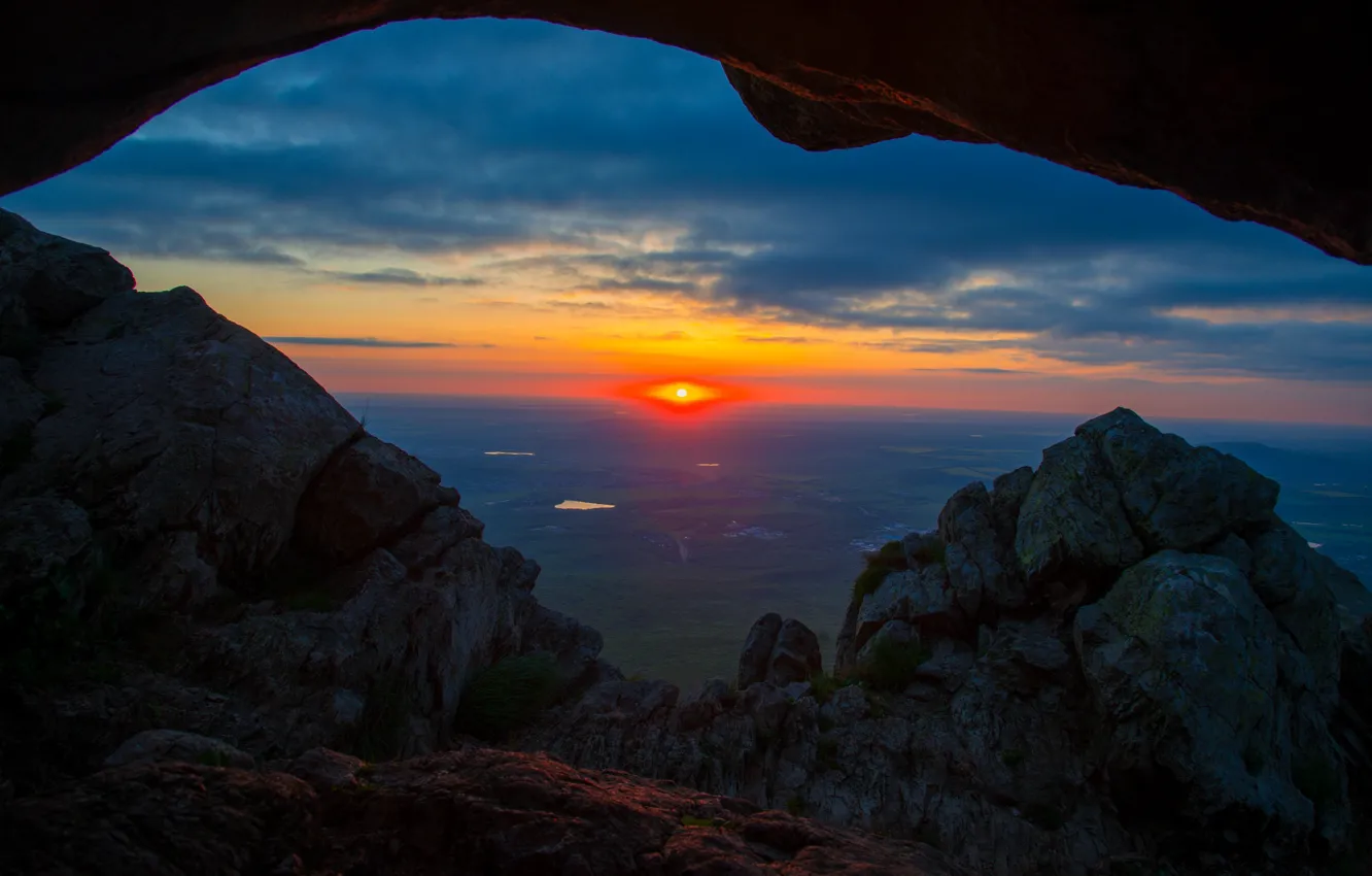 Photo wallpaper the sky, the sun, clouds, sunset, mountains, stones, rocks, view