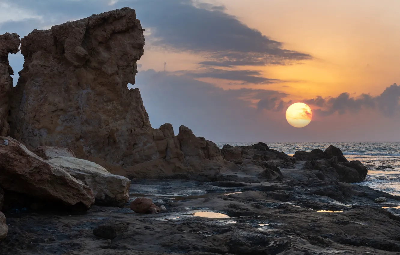 Photo wallpaper sea, the sky, the sun, clouds, sunset, clouds, stones, rocks