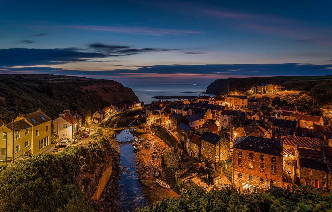 Photo wallpaper sea, the sky, sunset, bridge, lights, rocks, coast, boat