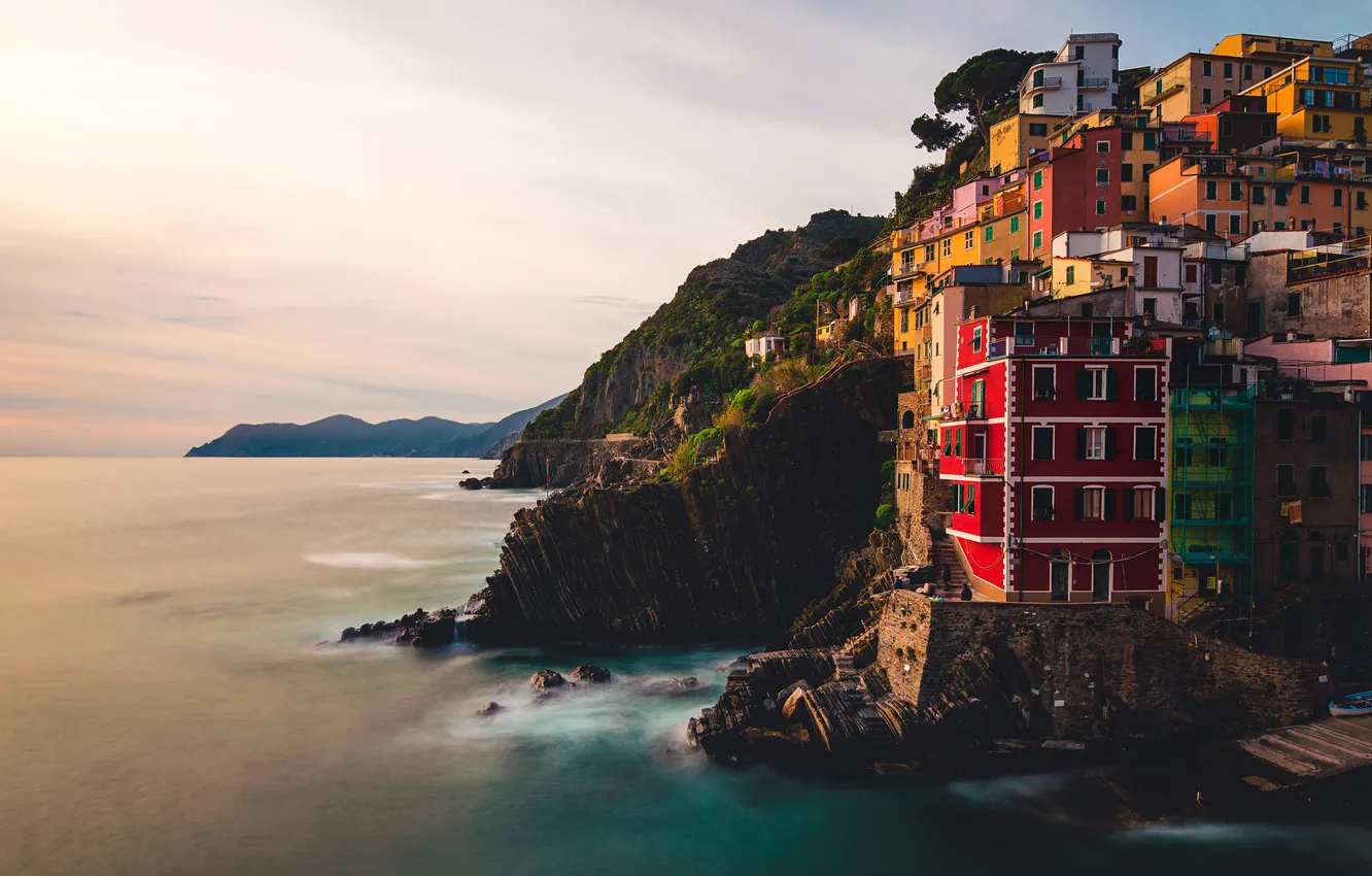 Photo wallpaper sea, the sky, clouds, the city, stones, rocks, shore, coast