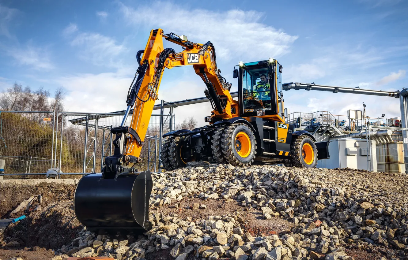 Photo wallpaper the sky, stones, driver, cabin, excavator, works, wheel, bucket