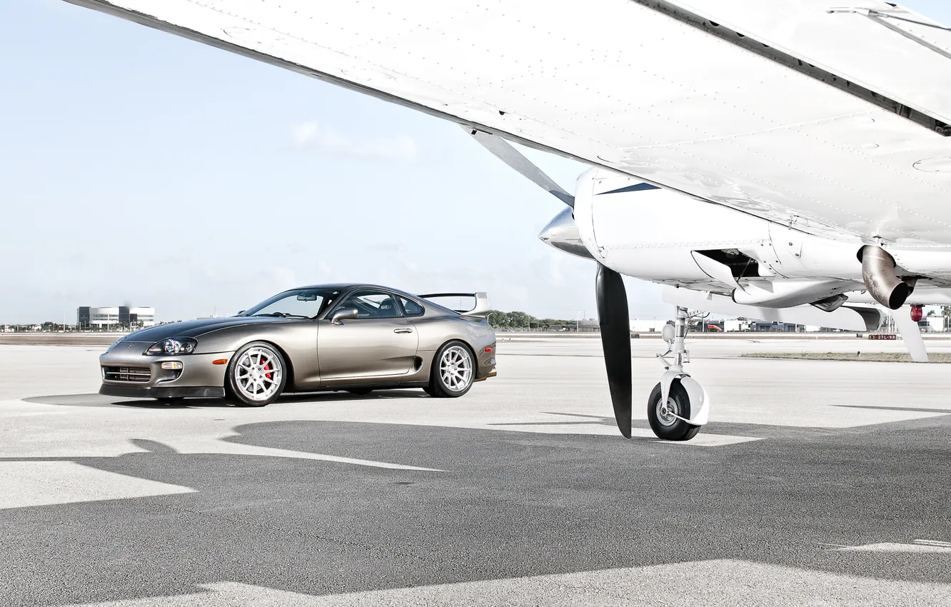 Photo wallpaper the sky, clouds, wings, shadow, silver, propeller, Toyota, the plane