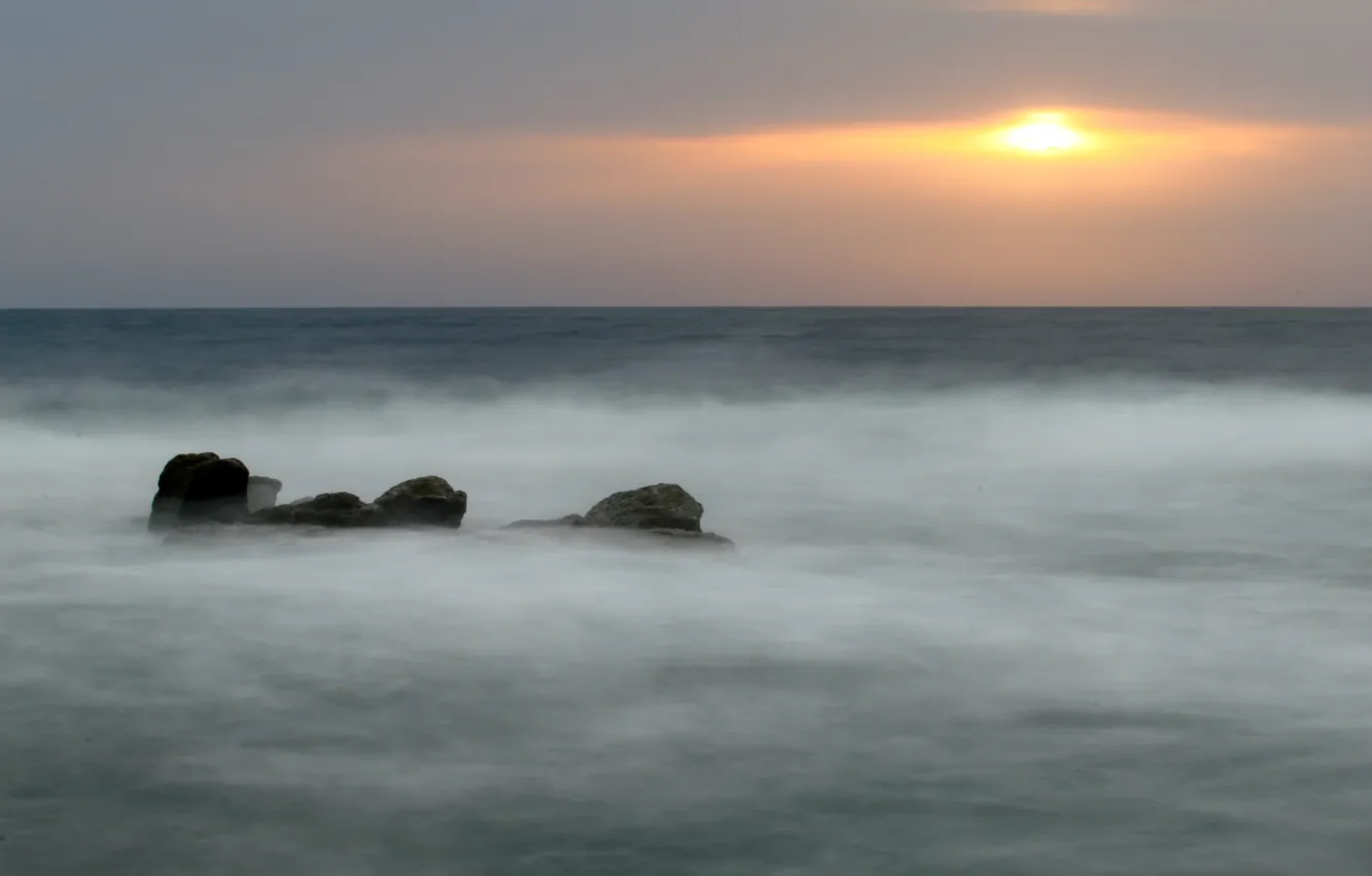 Photo wallpaper sea, wave, the sky, water, the sun, sunset, fog, stones