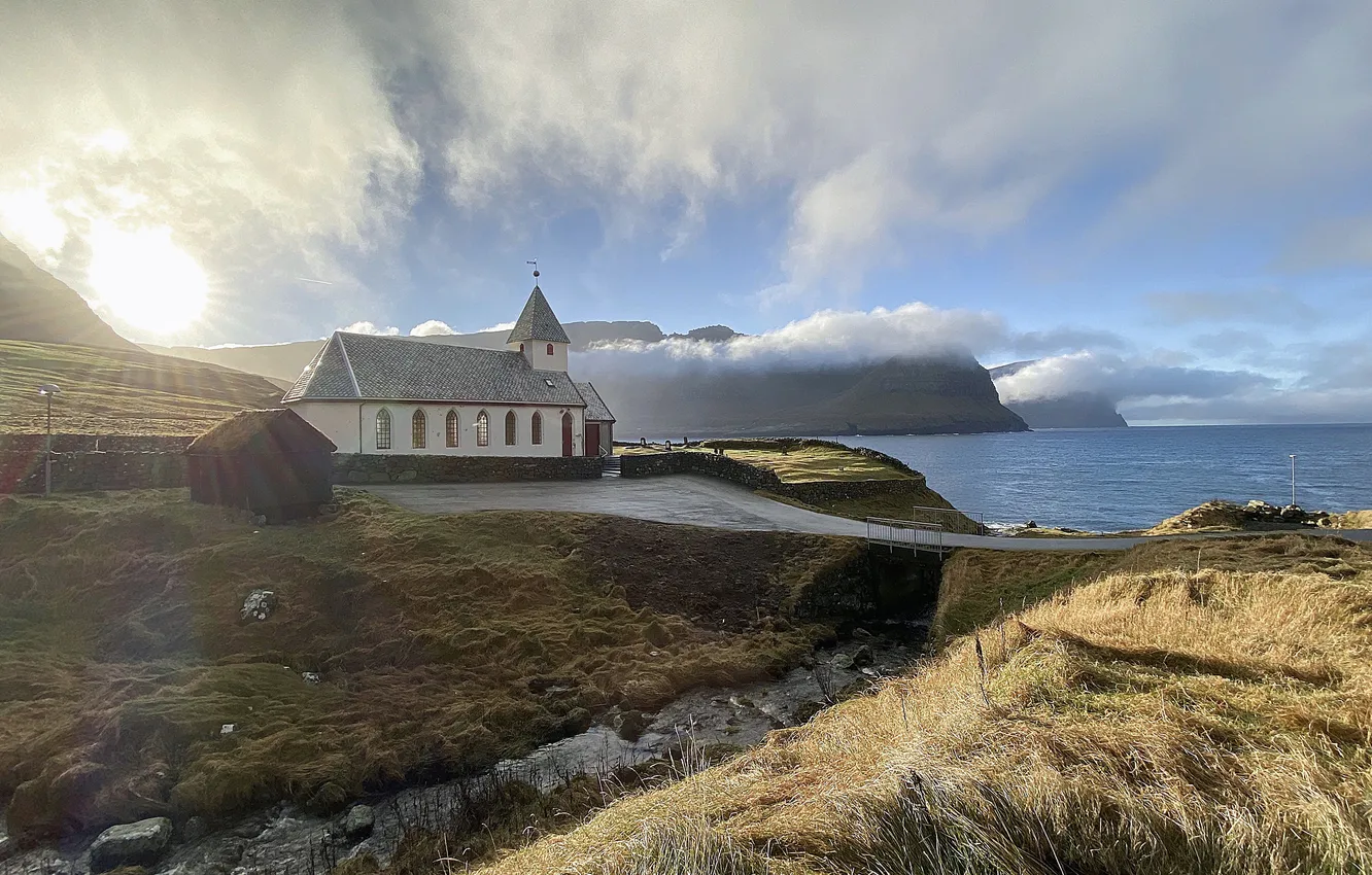 Photo wallpaper sea, the sky, grass, the sun, clouds, rays, light, mountains